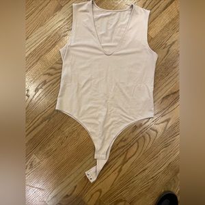 5 for $20
A New Day Sleeveless Nude Plunge Neck Knit Bodysuit Large Snap Crotch